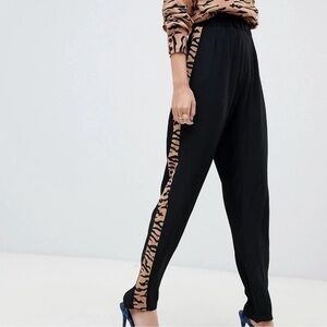 ASOS Na-Kd joggers track pants black tiger print side stripes dressy Size 34